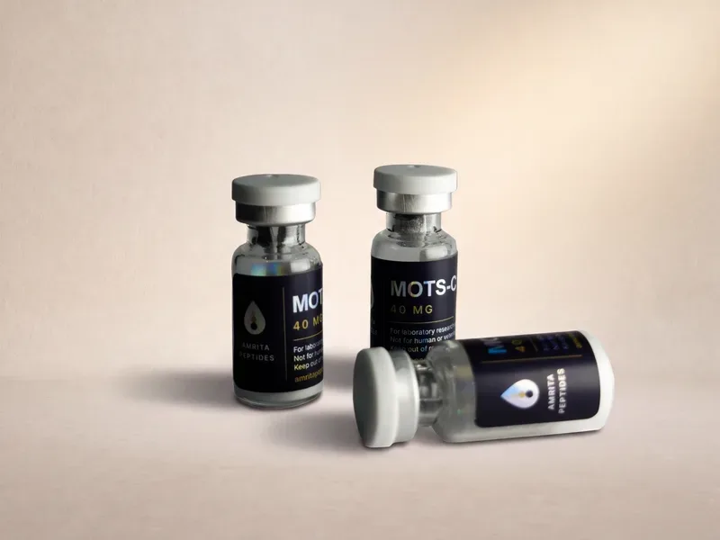 Amrita Peptides labeled MOTS-C 40 mg vials, one lying on its side showing the drop logo panel